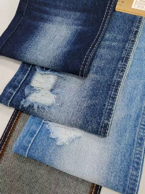 Tissu denim style TWILL 80% coton à faible rétrécissement INDIGO FONCÉ pour jeans femme ou pantalons garçon